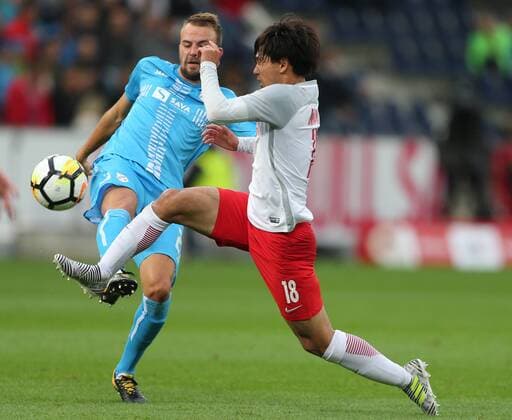 SOCCER - UEFA CL quali, RBS vs Rijeka SALZBURG,AUSTRIA,26.JUL.17 - SOCCER - UEFA Champions League qualification, Red Bull Salzburg vs HNK Rijeka. Image shows Josip Misic (Rijeka) and Takumi Minamino (RBS). GEPAxpictures xThomasxBachun