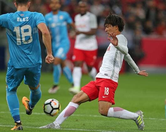 SOCCER - UEFA CL quali, RBS vs Rijeka SALZBURG,AUSTRIA,26.JUL.17 - SOCCER - UEFA Champions League qualification, Red Bull Salzburg vs HNK Rijeka. Image shows Josip Elez (Rijeka) and Takumi Minamino (RBS). GEPAxpictures xThomasxBachun