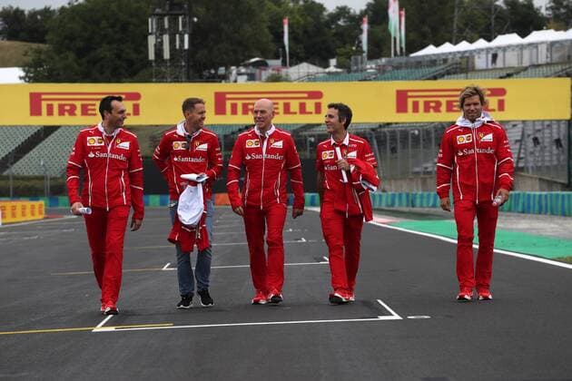 Hungarian Grand Prix, Hungaroring 27 - 30 July 2017 27.07.2017 - Riccardo Adami (ITA) Ferrari Race Engineer, Sebastian Vettel (GER) Scuderia Ferrari SF70H and Claire Williams (GBR) Williams Deputy Team Principal. 