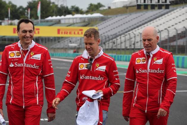 Hungarian Grand Prix, Hungaroring 27 - 30 July 2017 27.07.2017 - Riccardo Adami (ITA) Ferrari Race Engineer, Sebastian Vettel (GER) Scuderia Ferrari SF70H and Jock Clear (GBR) Ferrari Engineering Director 