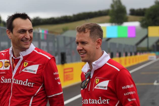 Hungarian Grand Prix, Hungaroring 27 - 30 July 2017 27.07.2017 - Riccardo Adami (ITA) Ferrari Race Engineer and Sebastian Vettel (GER) Scuderia Ferrari SF70H 