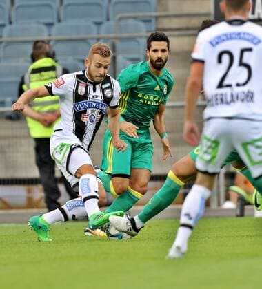 SOCCER - EL quali, Sturm vs Fenerbahce GRAZ,AUSTRIA,27.JUL.17 - SOCCER - UEFA Europa League qualification, SK Sturm Graz vs Fenerbahce Istanbul. Image shows Sandi Lovric (Sturm) and Alper Potuk(Fenerbahce). GEPAxpictures xHansxOberlaender