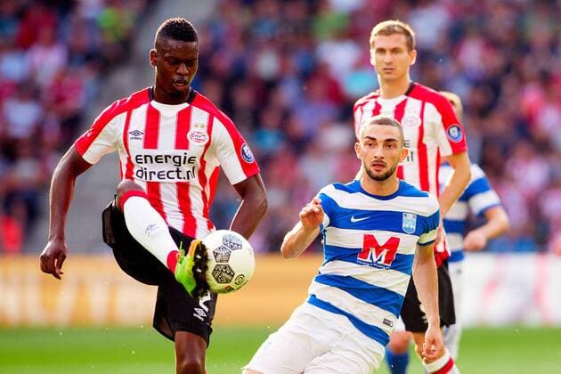 EINDHOVEN - PSV - Osijek , Voetbal , Seizoen 2017 2018 , PSV - Osijek , Europa League 2017-2018 , derde kwalificatie ronde Europa League , Philips Stadion , 27-07-2017 . PSV verdediger Nicolas Isimat-Mirin (L) in duel met Osijek speler Eros Grezda (R) . PSV - Osijek  x1656643x