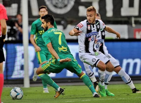 SOCCER - EL quali, Sturm vs Fenerbahce GRAZ,AUSTRIA,27.JUL.17 - SOCCER - UEFA Europa League qualification, SK Sturm Graz vs Fenerbahce Istanbul. Image shows Alper Potuk (Fenerbahce) and Sandi Lovric (Sturm). GEPAxpictures xHansxOberlaender
