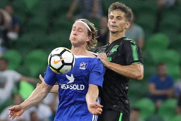 KRASNODAR, RUSSIA - JULY 27, 2017: FC Lyngby s Jeppe Kjaer (L), and FC Krasnodar s Alexander Martynovich in action in the first leg of their 2017 2018 UEFA Europa League third qualifying round tie at Krasnodar Stadium. Vitaly Timkiv TASS  TS05932C