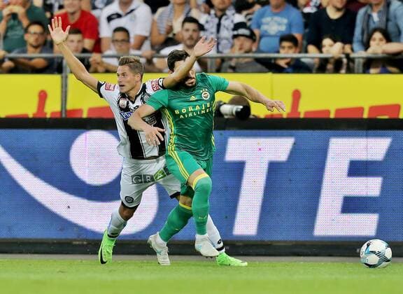 SOCCER - EL quali, Sturm vs Fenerbahce GRAZ,AUSTRIA,27.JUL.17 - SOCCER - UEFA Europa League qualification, SK Sturm Graz vs Fenerbahce Istanbul. Image shows Thorsten Roecher (Sturm) and Sener Oezbayrakli (Fenerbahce). GEPAxpictures xM.xOberlaender