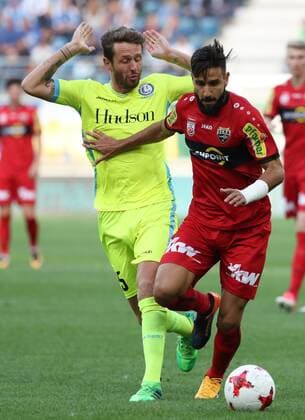 Gent s Damien Marcq and Altach s Lucas Galvao fight for the ball during a soccer game between Belgian club KAA Gent and Austrian team SC Rheindorf Altach, the first leg of the third qualifying round for the UEFA Europa League competition, Thursday 27 July 2017 in Gent. VIRGINIExLEFOUR  x05139774x