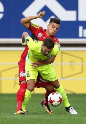 Gent s Birger Verstraete and Altach s Lucas Galvao fight for the ball during a soccer game between Belgian club KAA Gent and Austrian team SC Rheindorf Altach, the first leg of the third qualifying round for the UEFA Europa League competition, Thursday 27 July 2017 in Gent. VIRGINIExLEFOUR  x05139776x