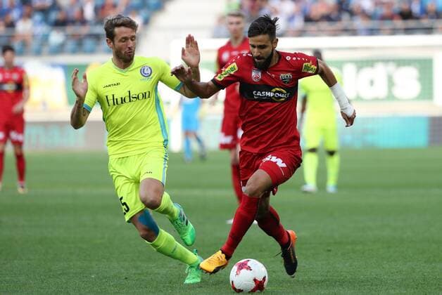 Gent s Damien Marcq and Altach s Lucas Galvao fight for the ball during a soccer game between Belgian club KAA Gent and Austrian team SC Rheindorf Altach, the first leg of the third qualifying round for the UEFA Europa League competition, Thursday 27 July 2017 in Gent. VIRGINIExLEFOUR  x05139777x