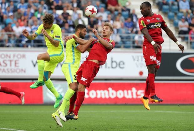 Gent s Damien Marcq, Gent s Samuel Gigot, Altach s Stefan Nutz and Altach s Louis Ngwat-Mahop fight for the ball during a soccer game between Belgian club KAA Gent and Austrian team SC Rheindorf Altach, the first leg of the third qualifying round for the UEFA Europa League competition, Thursday 27 July 2017 in Gent. VIRGINIExLEFOUR  x05139771x