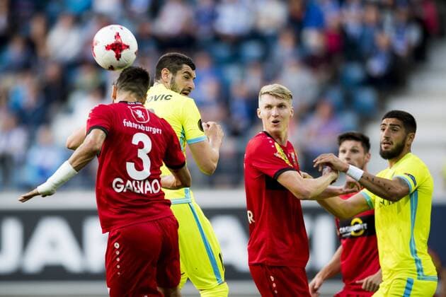 Altach s Lucas Galvao and Gent s Stefan Mitrovic fight for the ball during a soccer game between Belgian club KAA Gent and Austrian team SC Rheindorf Altach, the first leg of the third qualifying round for the UEFA Europa League competition, Thursday 27 July 2017 in Gent. JASPERxJACOBS  x05139788x