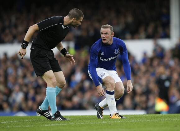 Referee checks on Wayne Rooney of Everton during the Europa League Qualifying Third Round 1st leg match at Goodison Park Stadium, Liverpool. Picture date: March 27th 2017. Pic credit should read: Simon Bellis Sportimage EDITORIAL USE ONLY. No use with unauthorised audio, video, data, fixture lists, club league logos or live services. Online in-match use limited to 120 images, no video emulation. No use in betting, games or single club league player publications.