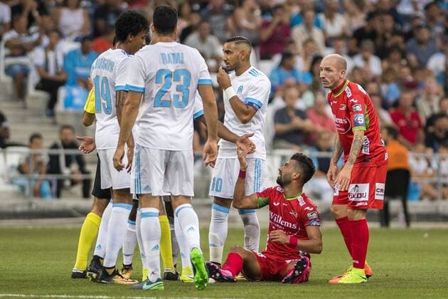 Oostende s Ramin Rezaeian lies injured on the ground during a soccer game between French club Olympique de Marseille and Belgian team KV Oostende, the first leg of the third qualifying round for the UEFA Europa League competition, Thursday 27 July 2017 in Marseille. LAURIExDIEFFEMBACQ  x05139886x
