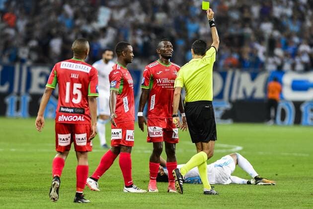 Oostende s Emmanuel Banda receives a yellow card from the referee during a soccer game between French club Olympique de Marseille and Belgian team KV Oostende, the first leg of the third qualifying round for the UEFA Europa League competition, Thursday 27 July 2017 in Marseille. LAURIExDIEFFEMBACQ  x05140064x