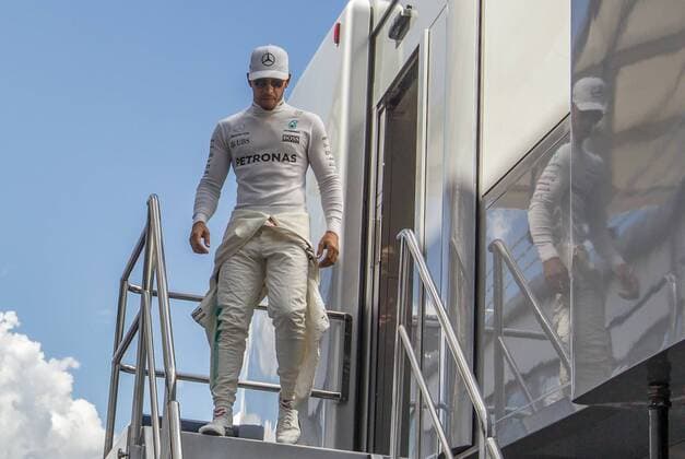 July 28, 2017 - MogyoroD, Hungary - Lewis Hamilton of Great Britain and Mercedes AMG Petronas driver goes to his garage during the free practice session at Pirelli Hungarian Formula 1 Grand Prix on Jul 28, 2017 in Mogyorod, Hungary. F1 Grand Prix of Hungary - Practice  - ZUMAn230 20170728_zaa_n230_213 Copyright: xRobertxSzaniszlox