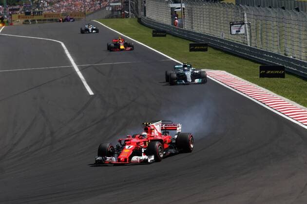 Hungarian Grand Prix, Hungaroring 27 - 30 July 2017 30.07.2017 - Race, Kimi Raikkonen (FIN) Scuderia Ferrari SF70H leads Valtteri Bottas (FIN) Mercedes AMG F1 W08 