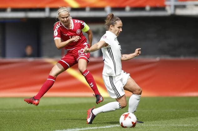 (170730) -- ROTTERDAM, July 30, 2017 -- Pernille Harder (L) of Denmark makes a shot during the UEFA Women s EURO 2017 soccer tournament quarter-final match between Germany and Denmark at Sparta Stadium in Rotterdam, the Netherlands, July 30, 2017. Denmark won 2-1. ) (SP)NETHERLANDS-ROTTERDAM-UEFA-WOMEN S EURO 2017-QUARTER FINAL YexPingfan 