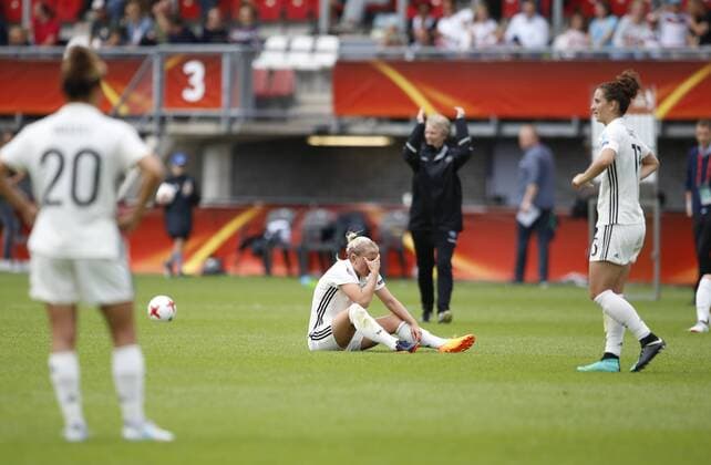 (170730) -- ROTTERDAM, July 30, 2017 -- Players of Germany react after loosing the UEFA Women s EURO 2017 soccer tournament quarter-final match between Germany and Denmark at Sparta Stadium in Rotterdam, the Netherlands, July 30, 2017. Denmark won 2-1. ) (SP)NETHERLANDS-ROTTERDAM-UEFA-WOMEN S EURO 2017-QUARTER FINAL YexPingfan 