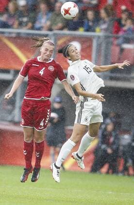 (170730) -- ROTTERDAM, July 30, 2017 -- Maja Kildemoes (L) of Denmark heads the ball with Sara Doorsoun-Khajeh of Germany during the UEFA Women s EURO 2017 soccer tournament quarter-final match between Germany and Denmark at Sparta Stadium in Rotterdam, the Netherlands, July 30, 2017. Denmark won 2-1. ) (SP)NETHERLANDS-ROTTERDAM-UEFA-WOMEN S EURO 2017-QUARTER FINAL YexPingfan 