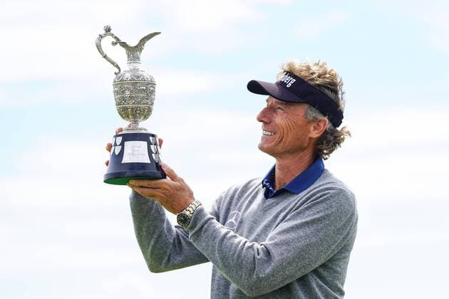 July 30th, Royal Porthcawl, Wales; The European Tour Senior Open Championship presented by Rolex, final round; Bernhard Langer GER looks at the trophy he has just won xStevexFeeneyx  ActionPlus11908159