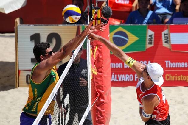 Beach volleyball Beachvolleyball - FIVB World Championships 2017 VIENNA,AUSTRIA,31.JUL.17 - BEACH VOLLEYBALL - FIVB World Championships, men. Image shows Christoph Dressler (AUT) and Saymon Barbosa Santos (BRA). GEPAxpictures xMaticxKlansek