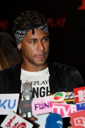 Brazilian football star Neymar is interviewed as he arrives at the Replay new Fall Winter 2017 18 collection with a label heritage for new Rebels & Heroes in Shanghai, China, 31 July 2017. Neymar, Karen Mok pair up to highlight Replay new Fall Winter 2017 18 collection in Shanghai  20170731_82405