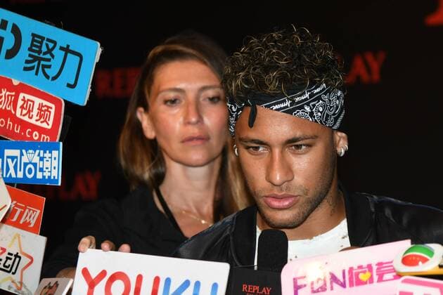 Brazilian football star Neymar is interviewed as he arrives at the Replay new Fall Winter 2017 18 collection with a label heritage for new Rebels & Heroes in Shanghai, China, 31 July 2017. Neymar, Karen Mok pair up to highlight Replay new Fall Winter 2017 18 collection in Shanghai  20170731_48792