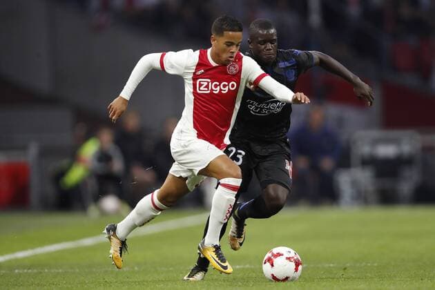 (L-R) Justin Kluivert of Ajax, Malang Sarr of OCG Nice during the UEFA Champions League third round qualifying first leg match between Ajax Amsterdam and OGC Nice at the Amsterdam Arena on August 02, 2017 in Amsterdam, The Netherlands Ajax v OGC Nice UEFA Champions League 2017 2018 xVIxVIxImagesx xMauricexvanxSteenxIVx 8373961