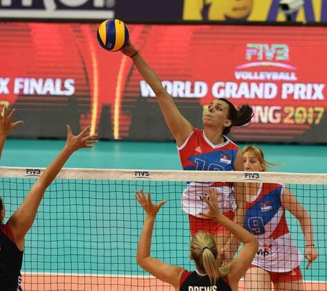 Milena Rasic, back, of Serbia spikes against USA during their match of the FIVB Volleyball World Grand Prix Finals 2017 in Nanjing city, east China s Jiangsu province, 2 August 2017. Serbia defeated USA 3-2 (25:22, 25:17, 23:25, 18:25, 15:11). Serbia plays hard to defeat USA at FIVB Volleyball World Grand Prix Finals 2017  20170802_80638