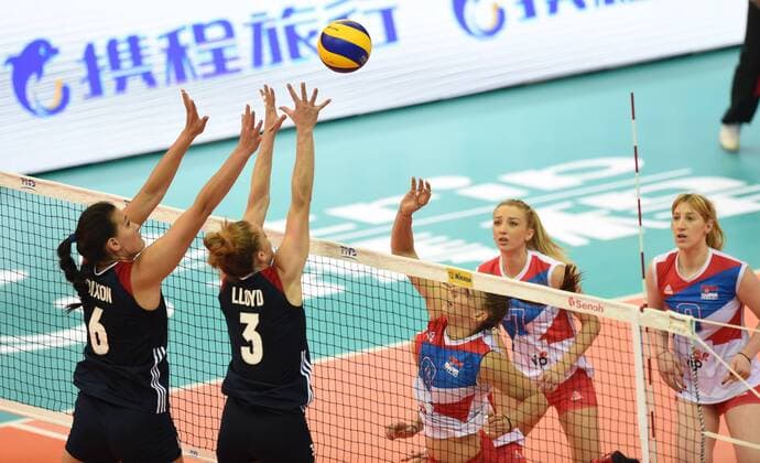 (From left) TeTori Dixon and Carli Lloyd of USA jump to block a shot by Tijana Malesevic of Serbia during their match of the FIVB Volleyball World Grand Prix Finals 2017 in Nanjing city, east China s Jiangsu province, 2 August 2017. Serbia defeated USA 3-2 (25:22, 25:17, 23:25, 18:25, 15:11). Serbia plays hard to defeat USA at FIVB Volleyball World Grand Prix Finals 2017  20170802_05910