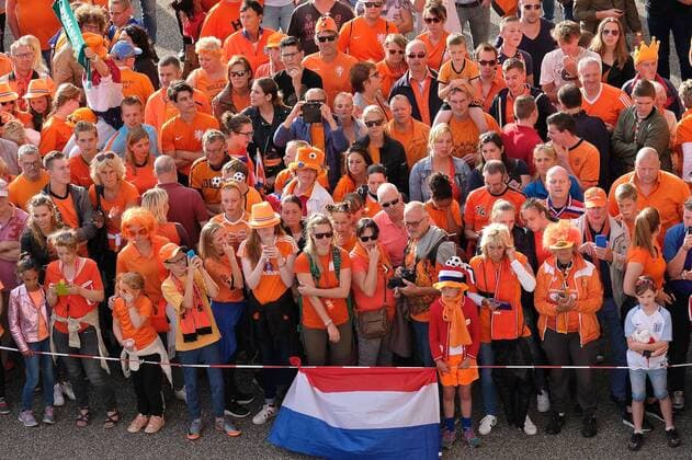 Netherlands Women v England Women UEFA Women s Euros 2017 Netherlands fans with a sole young England fan (right) await the arrival of the team coaches pictured ahead of the UEFA Women s Euros 2017 Semi-final match at De Grolsch Veste, Enschede Copyright: xKristianxKanex FIL-10476-0024 UK Newspapers OUT