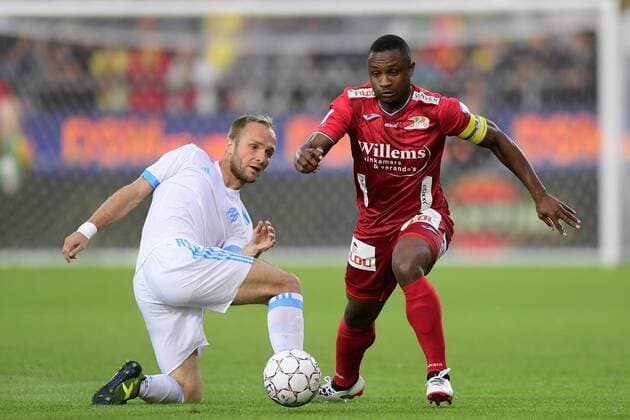 Sebastien Siani midfielder of KV Ostende is challenged by Valere Germain midfielder of OM FOOTBALL : Ostende vs Marseille - Europa League - 03 08 2017 PhotoNews Panoramic  775014732