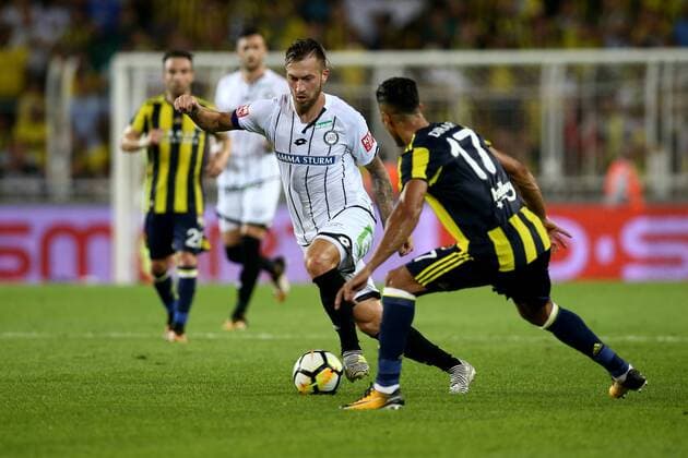 SOCCER - UEFA EL quali, Fenerbahce vs Sturm ISTANBUL,TURKEY,03.AUG.17 - SOCCER - UEFA Europa League qualification, Fenerbahce Istanbul vs SK Sturm Graz. Image shows Peter Zulj (Sturm) and Nabil Dirar (Fenerbahce). GEPAxpictures xDanielxGoetzhaber