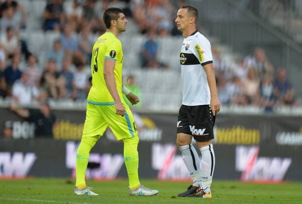 SOCCER - UEFA EL quali, Altach vs Gent INNSBRUCK,AUSTRIA,03.AUG.17 - SOCCER - UEFA Europa League qualification, SCR Altach vs KAA Gent. Image shows Johannes Aigner (Altach) and Stefan Mitrovic (Gent). GEPAxpictures xAmirxBeganovic