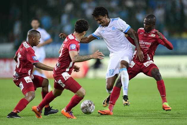 Luis Gustavo midfielder of OM is challenged by Andile Ernest Jali midfielder of KV Ostende and Knowledge Musona forward of KV Ostende FOOTBALL : Ostende vs Marseille - Europa League - 03 08 2017 PhotoNews Panoramic  775014732