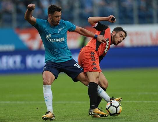 August 3, 2017 - Saint Petersburg, Russia - Giuliano (L) of FC Zenit Saint Petersburg and Stav Finish of FC Bnei Yehuda vie for the ball during the UEFA Europa League match, Third Qualifying Round, 2nd Leg between FC Zenit St. Petersburg and FC Bnei Yehuda at Saint Petersburg Stadium on August 03, 2017 in St. Petersburg, Russia. Zenit Saint Petersburg v Bnei Yehuda - UEFA Europa League Third Qualifying Round: Second Leg  - ZUMAn230 20170803_zaa_n230_176 Copyright: xIgorxRussakx