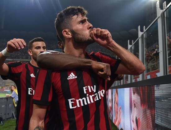 (170804) -- MILAN, Aug. 4, 2017 -- AC Milan s Patrik Cutrone (Front) celebrates after scoring during the Europa League third qualifying round second leg soccer match against U Craiova at the San Siro Stadium in Milan, Italy, Aug. 3, 2017. AC Milan won 2-0. ) (SP)ITALY-MILAN-SOCCER-EUROPA LEAGUE-AC MILAN-CRAIOVA AlbertoxLingria 
