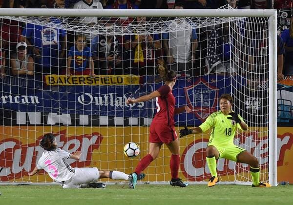 CARSON, CA - AUGUST 03: Alex Morgan (13) of USA scores a goal in the second half against Ayaka Yamashita (18) of Japan during the Tournament of Nations soccer match between USA and Japan on August 03, 2017 at StubHub Center in Carson, CA. USA defeated Japan 3-0, and Australia won the tournament. (Photo by Chris Williams Icon Sportswire) SOCCER: AUG 03 Tournament of Nations - USA v Japan Icon00717080116286 EDITORIAL USE ONLY