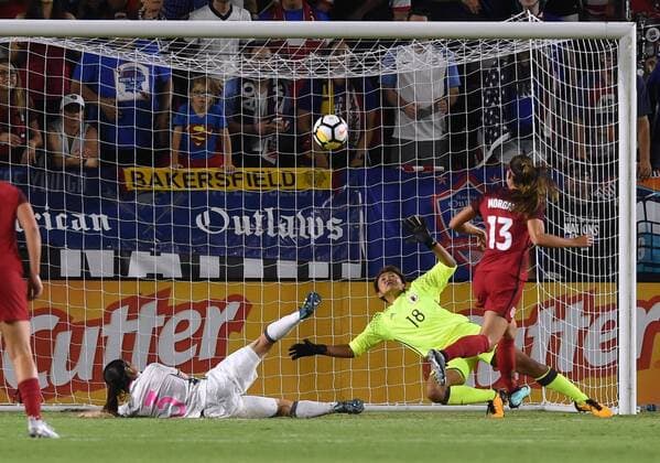 CARSON, CA - AUGUST 03: Alex Morgan (13) of USA scores a goal in the second half against Ayaka Yamashita (18) of Japan during the Tournament of Nations soccer match between USA and Japan on August 03, 2017 at StubHub Center in Carson, CA. USA defeated Japan 3-0, and Australia won the tournament. (Photo by Chris Williams Icon Sportswire) SOCCER: AUG 03 Tournament of Nations - USA v Japan Icon00717080116289 EDITORIAL USE ONLY