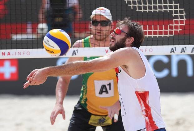 Beach volleyball Beachvolleyball - FIVB World Championships 2017 VIENNA,AUSTRIA,04.AUG.17 - BEACH VOLLEYBALL - FIVB World Championships. Image shows Ben Saxton (CAN) and Alison Cerutti (BRA). GEPAxpictures xChristianxWalgram