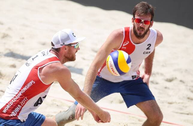 Beach volleyball Beachvolleyball - FIVB World Championships 2017 VIENNA,AUSTRIA,04.AUG.17 - BEACH VOLLEYBALL - FIVB World Championships. Image shows Chaim Schalk and Ben Saxton (CAN). GEPAxpictures xChristianxWalgram