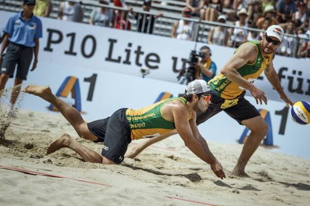 VIENNA, AUSTRIA - AUGUST 04: Bruno Oscar Schmidt and Alison Conte Cerutti of Brazil in action during Day 8 of the FIVB Beach volleyball Beachvolleyball World Championships 2017 on August 4, 2017 in Vienna, Austria. (Photo by Martin Steinthaler Hoch Zwei) Vienna Austria xHOCHxZWEIx