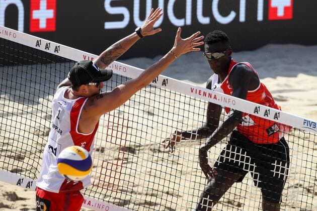 Beach volleyball Beachvolleyball - FIVB World Championships 2017 VIENNA,AUSTRIA,04.AUG.17 - BEACH VOLLEYBALL - FIVB World Championships, men. Image shows Clemens Doppler (AUT) and Cherif Younousse (QAT). GEPAxpictures xMaticxKlansek