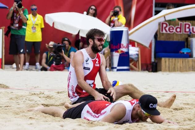 VIENNA, AUSTRIA - AUGUST 05: Ben Saxton and Chaim Schalk of Canada seen during Day 9 of the FIVB Beach volleyball Beachvolleyball World Championships 2017 on August 5, 2017 in Vienna, Austria. (Photo by Michael Kunkel Hoch Zwei) Vienna Austria xHOCHxZWEIx