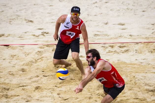 VIENNA, AUSTRIA - AUGUST 05: Ben Saxton and Chaim Schalk of Canada in action during Day 9 of the FIVB Beach volleyball Beachvolleyball World Championships 2017 on August 5, 2017 in Vienna, Austria. (Photo by Michael Kunkel Hoch Zwei) Vienna Austria xHOCHxZWEIx