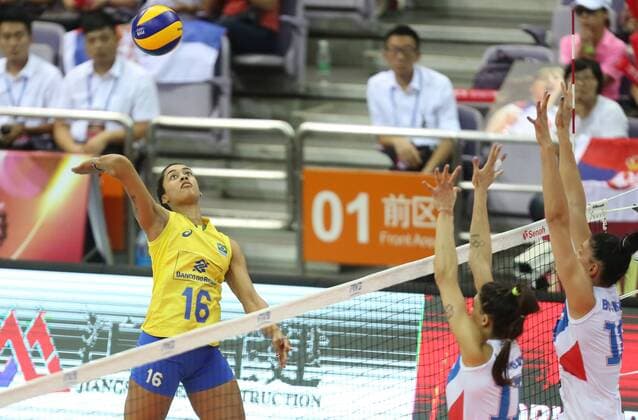 Stefana Veljkovic, left, and Tijana Boskovic of Serbia spike against Drussyla Costa of Brazil during their match of the FIVB Volleyball World Grand Prix Finals 2017 in Nanjing city, east China s Jiangsu province, 5 August 2017. Brazil defeated Serbia 3-1 (20-25, 25-23, 25-14, 25-23). Brazil eliminates Serbia at FIVB Volleyball World Grand Prix Finals 2017  20170805_80141