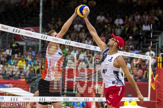 VIENNA, AUSTRIA - AUGUST 05: Christiaan Varenhorst of Netherlands competes against Pablo Herrera Allepuz of Spain during Day 9 of the FIVB Beach volleyball Beachvolleyball World Championships 2017 on August 5, 2017 in Vienna, Austria. (Photo by Michael Kunkel Hoch Zwei) Vienna Austria xHOCHxZWEIx