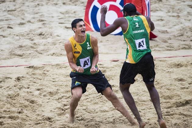 VIENNA, AUSTRIA - AUGUST 06: Andre Loyola Stein and Evandro Goncalves Oliveira Junior of Brazil celebrate during Day 10 of the FIVB Beach volleyball Beachvolleyball World Championships 2017 on August 6, 2017 in Vienna, Austria. (Photo by Michael Kunkel Hoch Zwei) Vienna Austria xHOCHxZWEIx