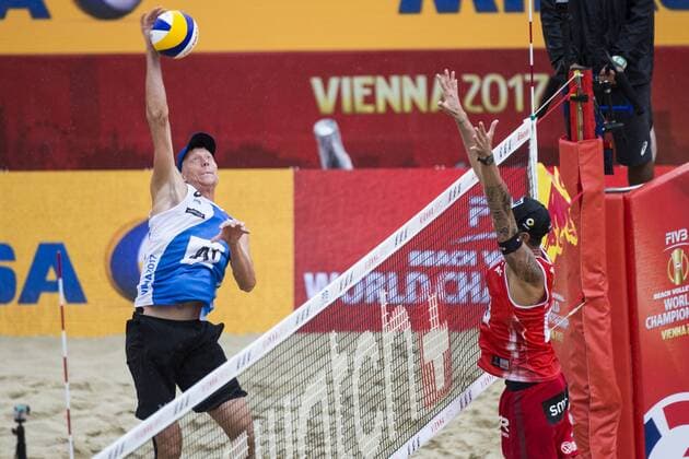 VIENNA, AUSTRIA - AUGUST 06: Nikita Liamin of Russia competes against Clemens Doppler of Austria during Day 10 of the FIVB Beach volleyball Beachvolleyball World Championships 2017 on August 6, 2017 in Vienna, Austria. (Photo by Michael Kunkel Hoch Zwei) Vienna Austria xHOCHxZWEIx