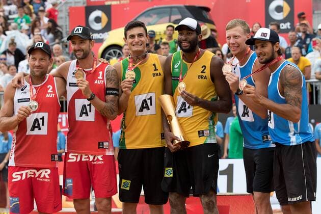 Beach volleyball Beachvolleyball - FIVB World Championships 2017 VIENNA,AUSTRIA,06.AUG.17 - BEACH VOLLEYBALL - FIVB World Championships, men, award ceremony. Image shows Clemens Doppler and Alexander Horst (AUT), Andre Loyola Stein and Evandro Goncalves Oliveira Junior (BRA) and Nikita Liamin and Viacheslav Krasilnikov (RUS). Keywords: trophy, medals. GEPAxpictures xMaticxKlansek